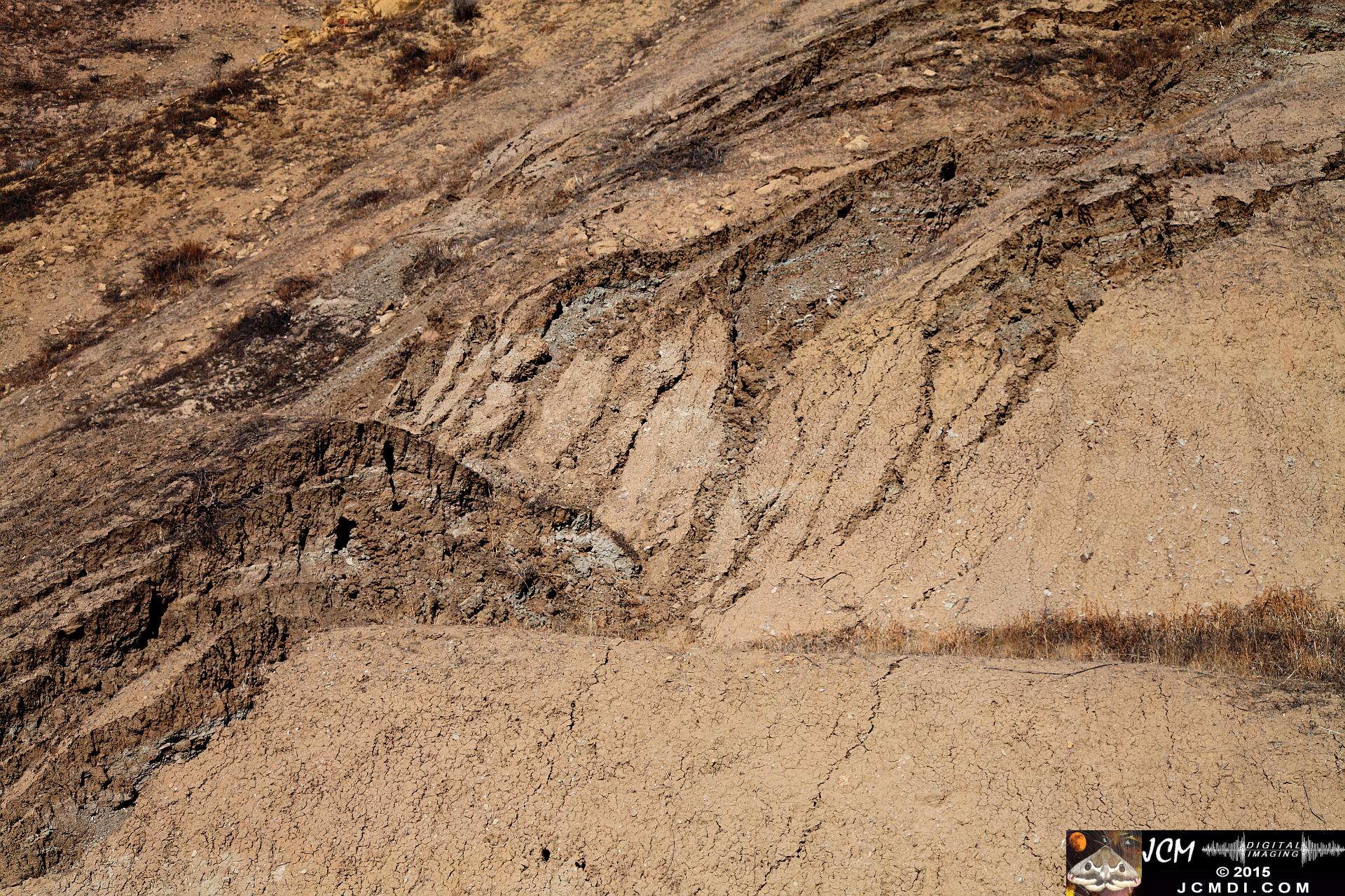 Landslide, buckled pavement, and terrain at Vasquez Canyon Road in Santa Clarita, CA filmed 11-25-2015